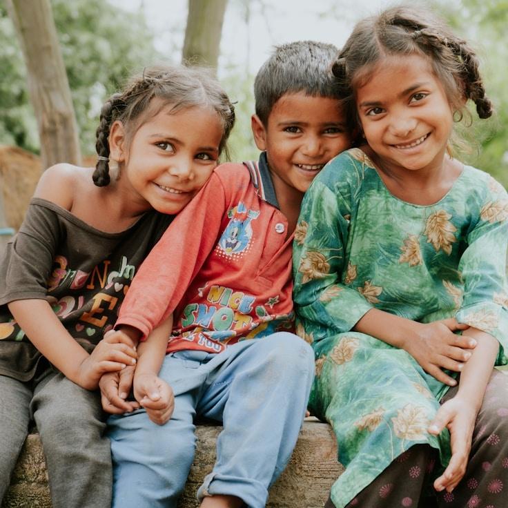 Mira Desai, Lead Design Curator at StudioLoomPlain, reviewing corporate floral arrangements